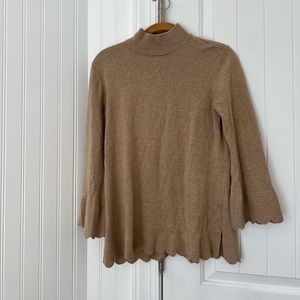 brown sweater with scalloped details